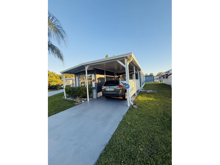 Land Lease Home - $833.06 Welcome to this beautifully maintained - Beach Home for sale in Port Saint Lucie, Florida on Beachhouse.com