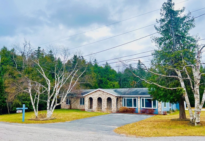 Come check out this almost 2500 sq. ft. open floorplan ranch - Beach Home for sale in Saint Ignace, Michigan on Beachhouse.com
