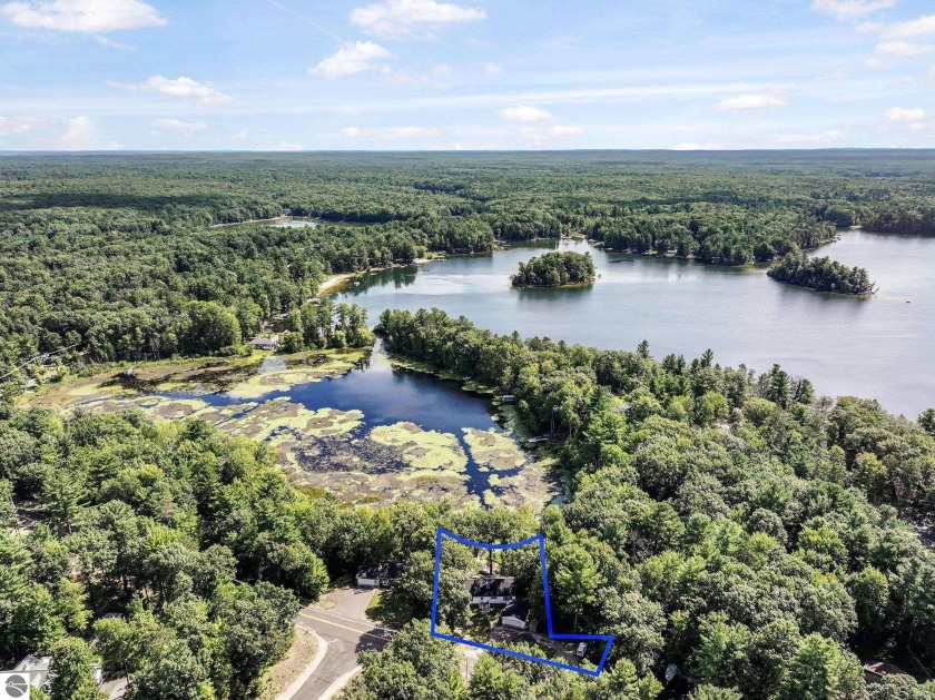 Discover the perfect blend of comfort and nature in this - Beach Home for sale in Traverse City, Michigan on Beachhouse.com