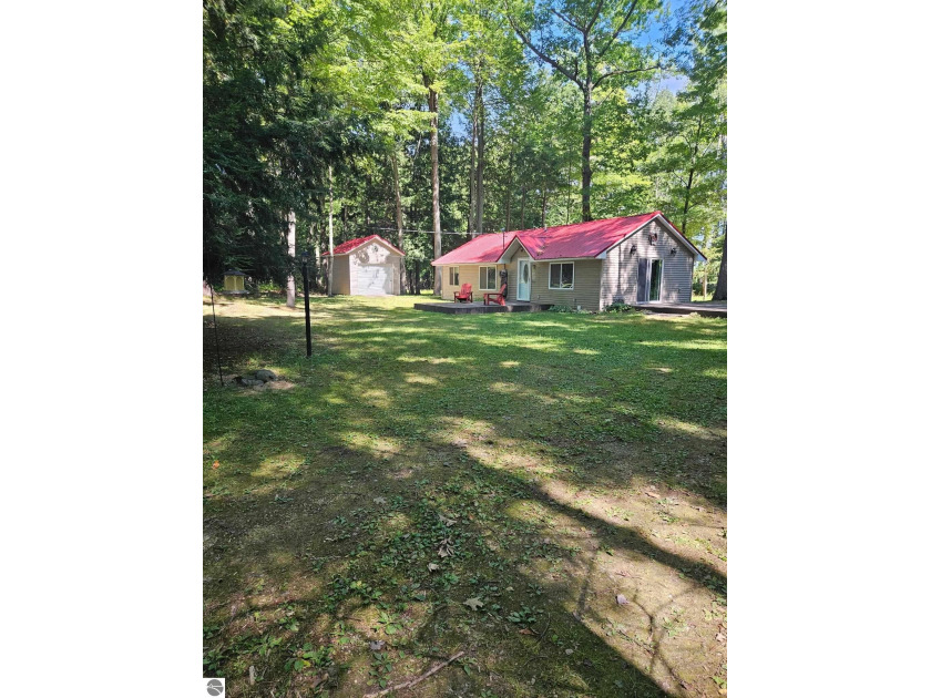 A fantastic opportunity to be in a secluded wooded setting and - Beach Home for sale in Au Gres, Michigan on Beachhouse.com