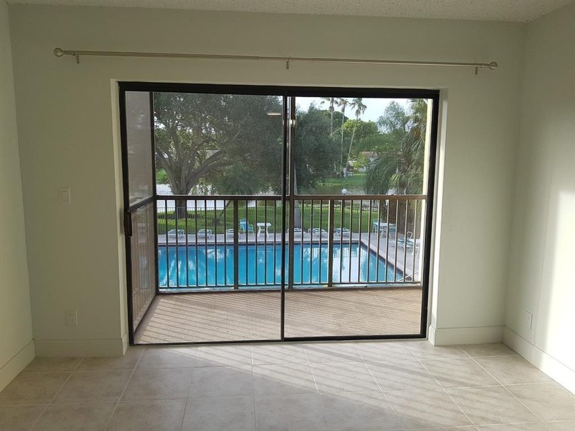 Beautiful views of the lake, pool, and green. Beautiful updated - Beach Condo for sale in Coral Springs, Florida on Beachhouse.com