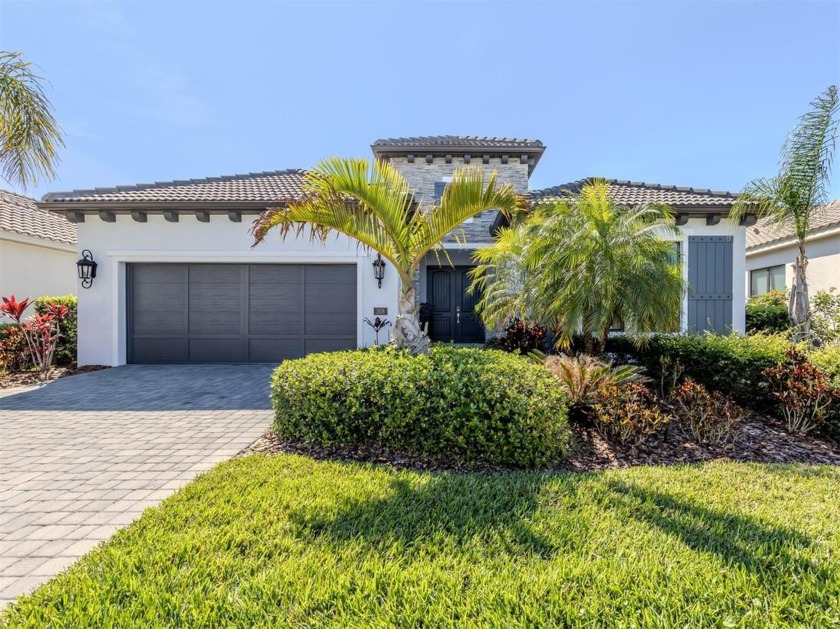 This luxury Neal Signature home delivers tremendous value in - Beach Home for sale in Nokomis, Florida on Beachhouse.com