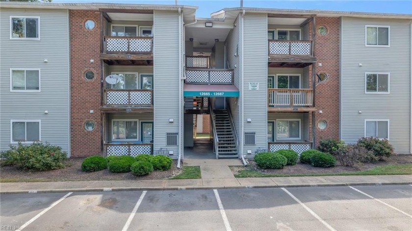 Welcome to your dream condo! This charming second-floor unit - Beach Home for sale in Newport News, Virginia on Beachhouse.com