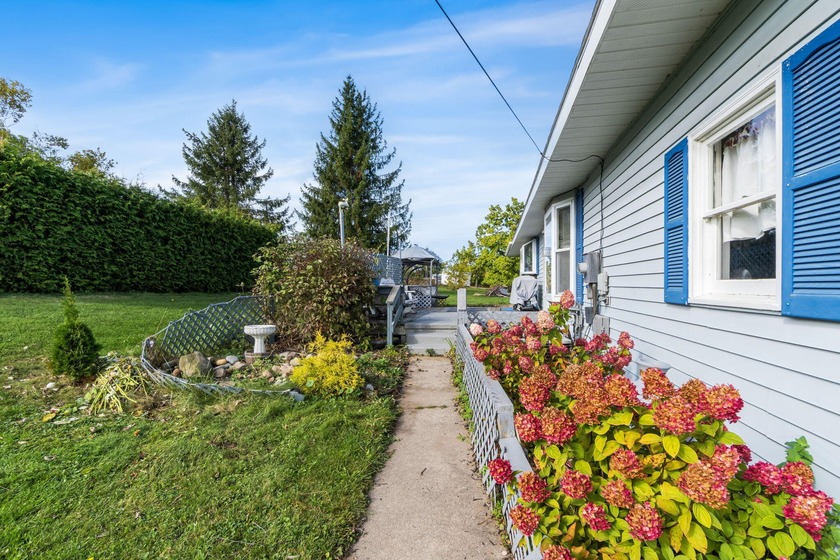 Enjoy peaceful views of the Cheboygan River from this - Beach Home for sale in Cheboygan, Michigan on Beachhouse.com