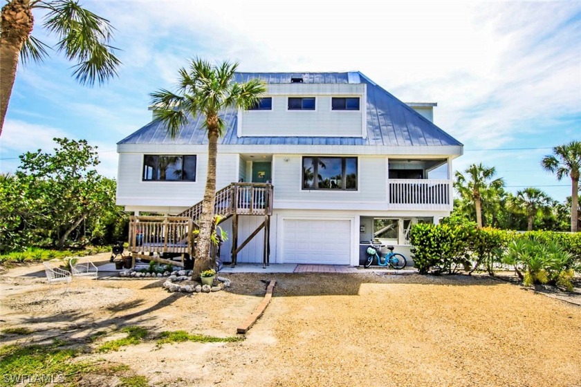 Seize this unparalleled opportunity on Southwinds Drive! Nestled - Beach Home for sale in Sanibel, Florida on Beachhouse.com