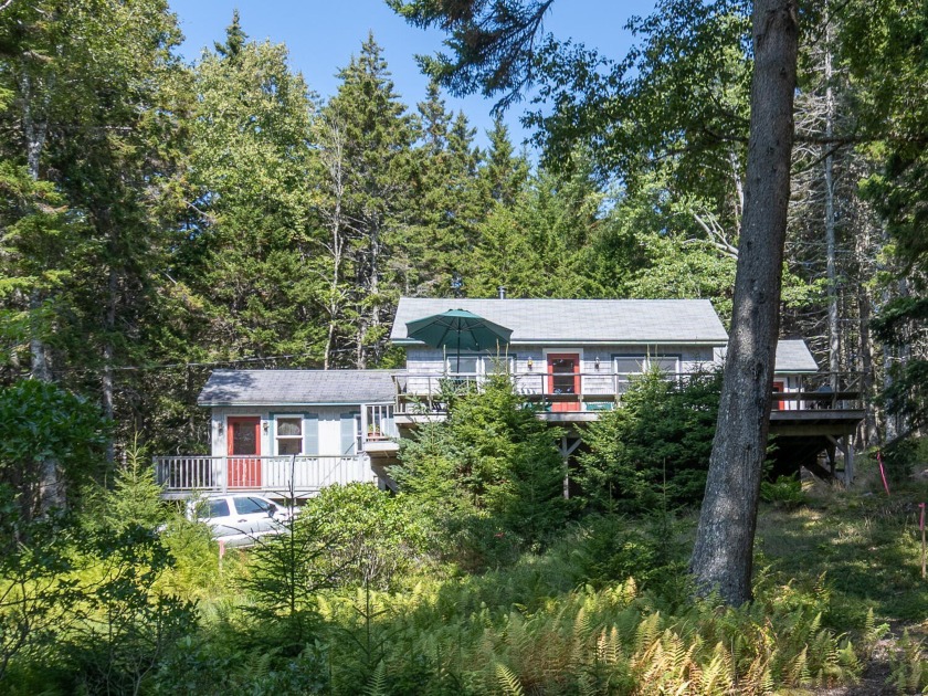 Perched on the hill ,this seasonal waterfront cottage has been - Beach Home for sale in Swans Island, Maine on Beachhouse.com