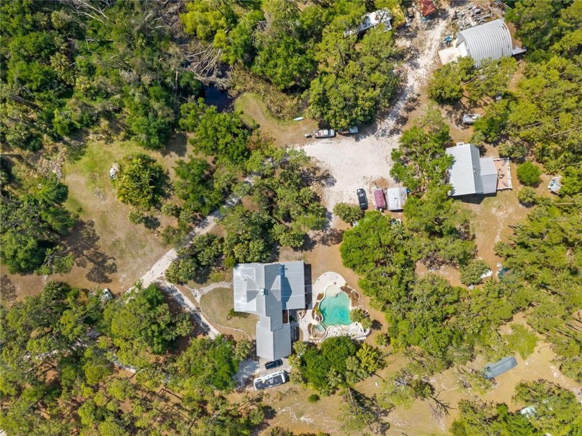 Nestled on 4.4 sprawling acres, this remarkable property offers - Beach Home for sale in Nokomis, Florida on Beachhouse.com