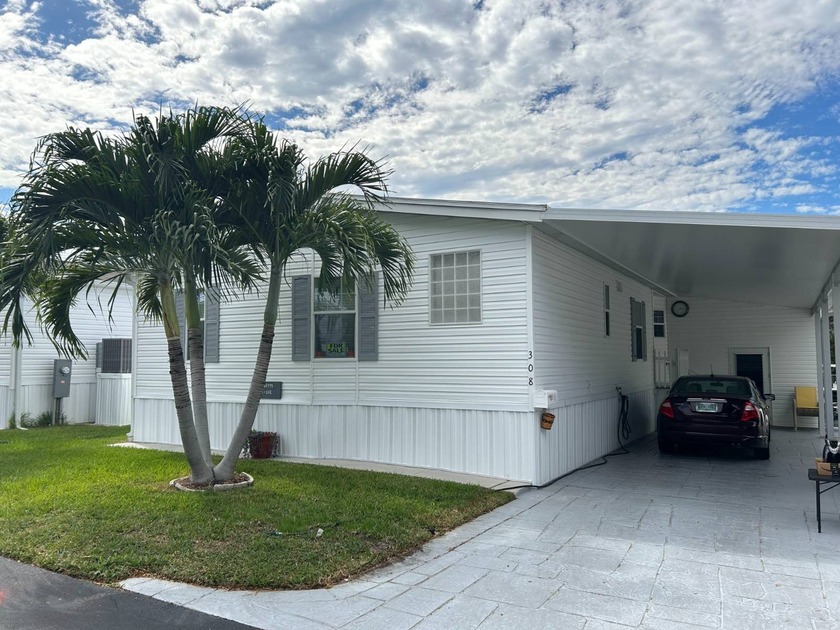 DIRECT ACCESS TO THE GULF OF AMERICA WITH PRIVATE BOAT SLIPS AND - Beach Home for sale in Naples, Florida on Beachhouse.com