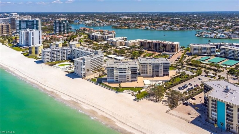 Experience the pinnacle of Naples beachfront living in this - Beach Home for sale in Naples, Florida on Beachhouse.com