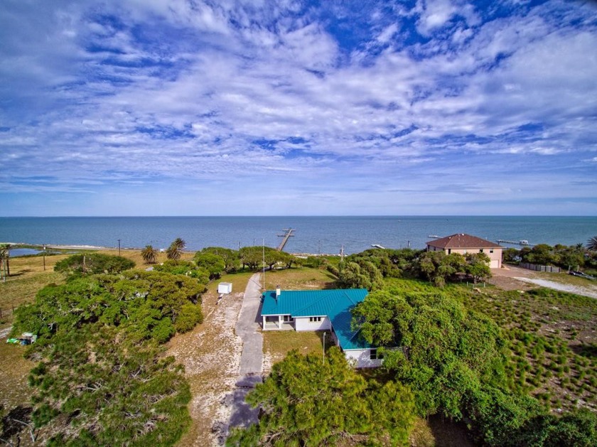 Exceptional coastal high-end home, perched on 3 +/- acres with - Beach Home for sale in Fulton, Texas on Beachhouse.com