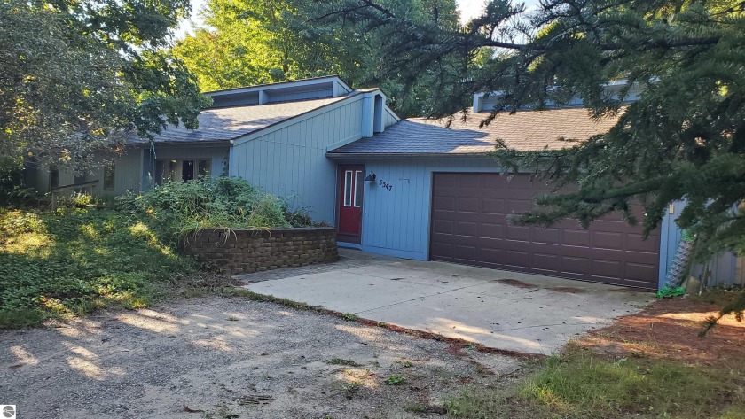 Here is your chance to gain immediate equity with some updates - Beach Home for sale in Traverse City, Michigan on Beachhouse.com