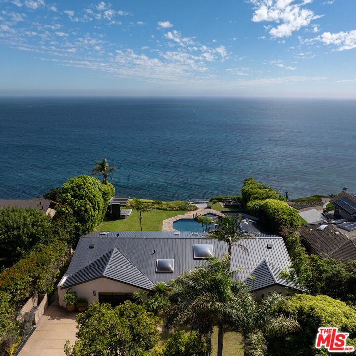 Exceptionally private and awash with natural light, this gated - Beach Home for sale in Malibu, California on Beachhouse.com