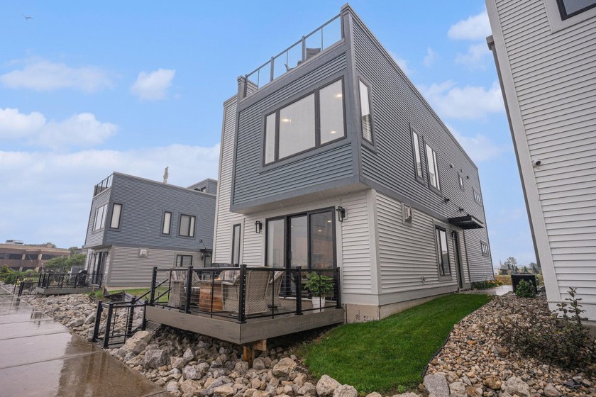Breathtaking panoramic views of Muskegon Lake await you in this - Beach Condo for sale in Muskegon, Michigan on Beachhouse.com