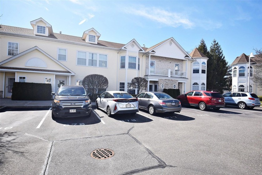 Welcome home to this ground floor condo situated across from the - Beach Condo for sale in Lindenhurst, New York on Beachhouse.com