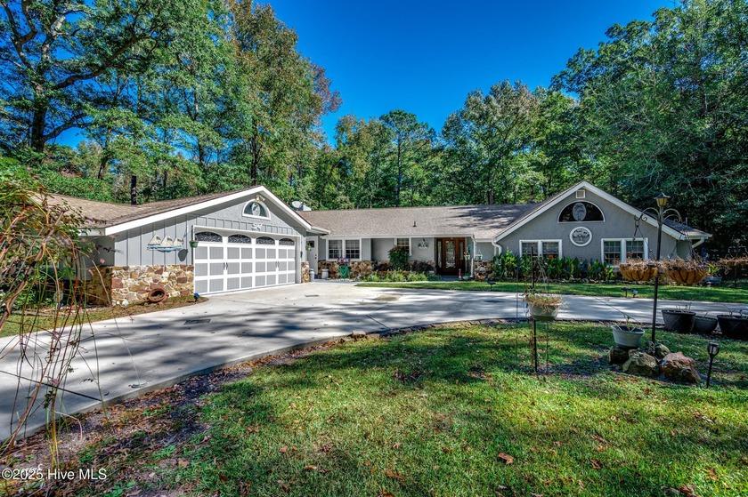 This incredibly expansive, custom stonefront home, with 1.38 - Beach Home for sale in Calabash, North Carolina on Beachhouse.com
