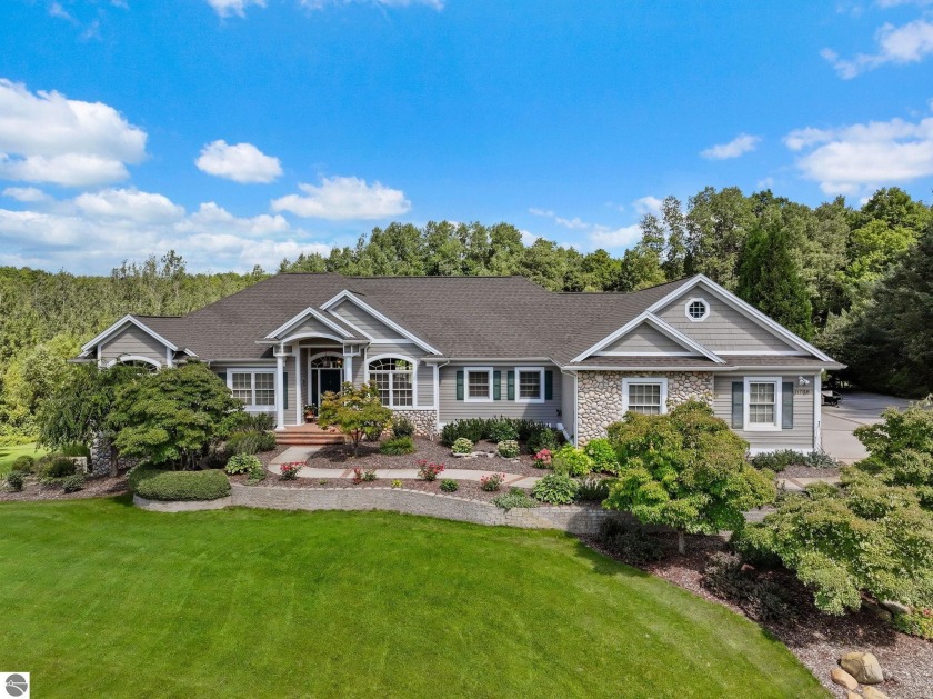 Welcome to life on Old Mission Peninsula! This builder's home - Beach Home for sale in Traverse City, Michigan on Beachhouse.com