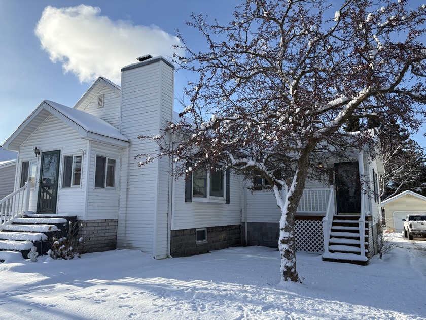 Own this beautiful two-bedroom, two-bath home with well cared - Beach Home for sale in Alpena, Michigan on Beachhouse.com