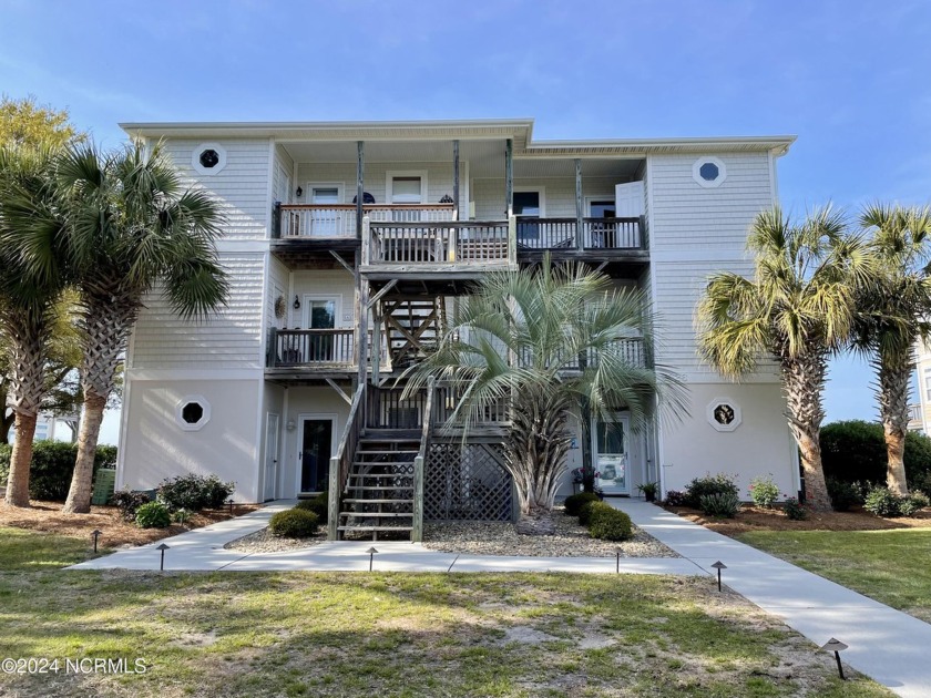 Indulge in the ultimate coastal lifestyle with this stunning 2 - Beach Condo for sale in Emerald Isle, North Carolina on Beachhouse.com