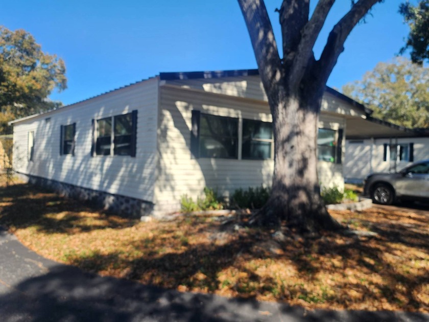 Welcome to this renovated manufactured home in a fabulous 55 and - Beach Home for sale in Largo, Florida on Beachhouse.com