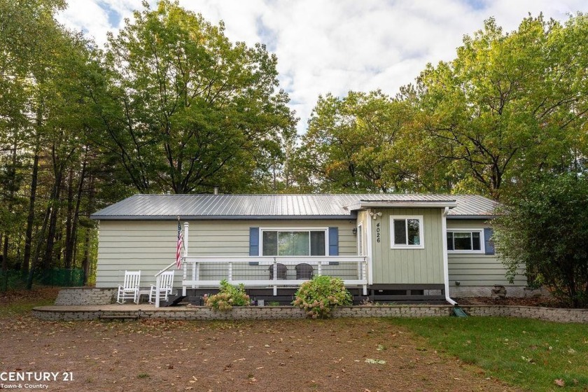 Welcome to your charming ranch home with access to the - Beach Home for sale in Marquette, Michigan on Beachhouse.com