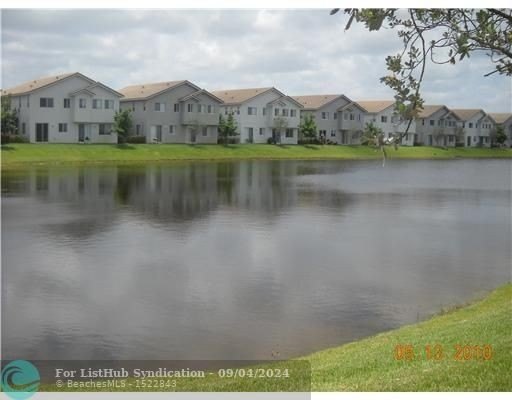 WOW-- Desirable two story townhome on the lake with 1 car garage - Beach Townhome/Townhouse for sale in Riviera Beach, Florida on Beachhouse.com