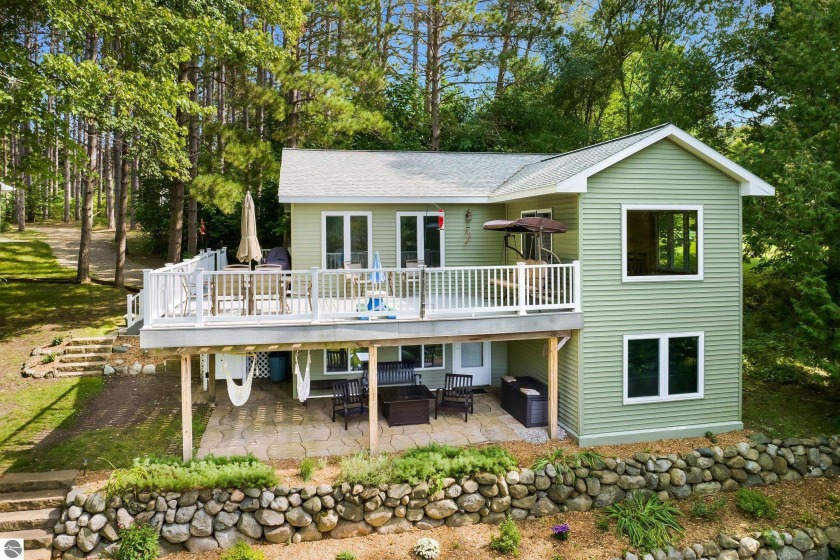 This amazing Wilson Lake home has it all! 150 ft private - Beach Home for sale in Ellsworth, Michigan on Beachhouse.com