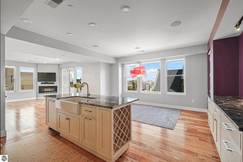 Experience premier downtown living in this coveted third-floor - Beach Condo for sale in Traverse City, Michigan on Beachhouse.com