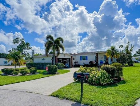 Welcome to your spacious retreat in the heart of Pine Lakes Golf - Beach Home for sale in North Fort Myers, Florida on Beachhouse.com