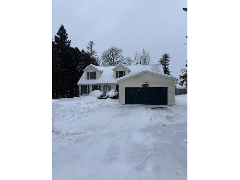 Discover this incredible lakeside home with 80' of prime - Beach Home for sale in Presque Isle, Michigan on Beachhouse.com