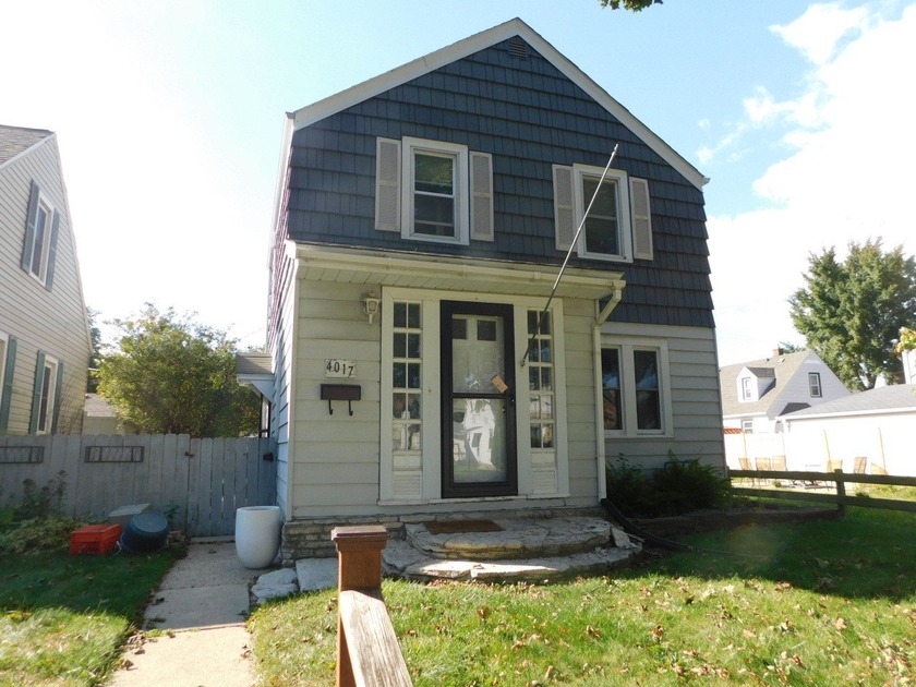 This charming Colonial home is full of character. Hardwood - Beach Home for sale in Milwaukee, Wisconsin on Beachhouse.com