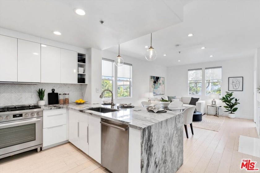 Discover this beautifully renovated single-level corner condo - Beach Condo for sale in Playa Vista, California on Beachhouse.com