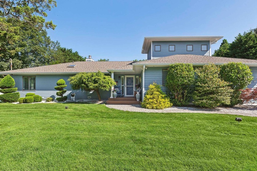 The appeal is instant as you arrive to this coastal escape in - Beach Home for sale in Westhampton, New York on Beachhouse.com