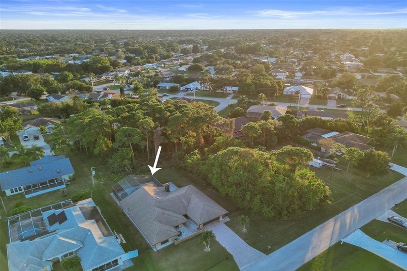 This vacant lot is next to a single-family home, both properties - Beach Lot for sale in Port Saint Lucie, Florida on Beachhouse.com