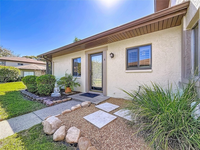 LIGHT, BRIGHT END-UNIT VILLA offering easy Florida living in - Beach Condo for sale in Clearwater, Florida on Beachhouse.com