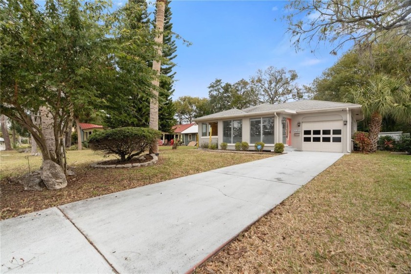 Charming Bungalow on the Cotee River with PRIVATE boat dock and - Beach Home for sale in New Port Richey, Florida on Beachhouse.com