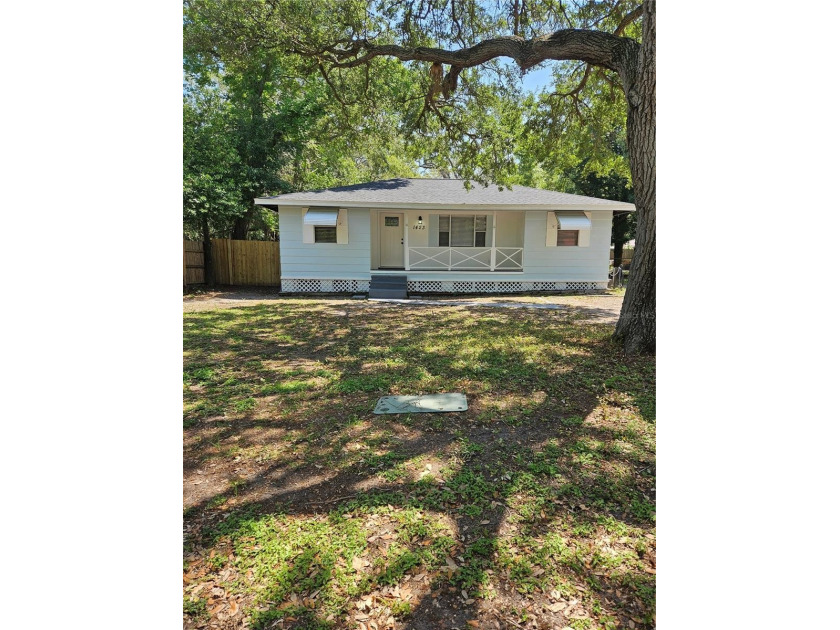Darling remodeled 3 bedroom home in the heart of Dunedin. Walk - Beach Home for sale in Dunedin, Florida on Beachhouse.com