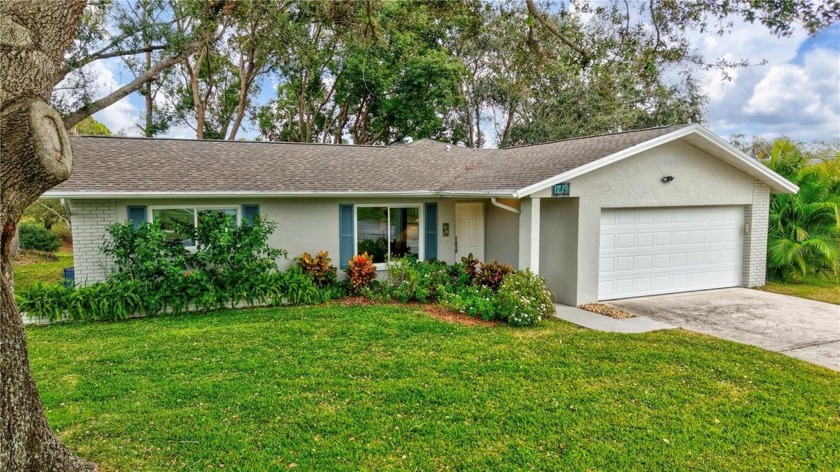 Nestled among rolling hills that gently slope down to the woods - Beach Home for sale in Palm Harbor, Florida on Beachhouse.com