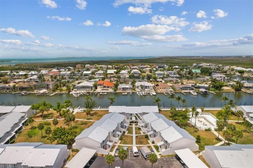 Welcome to Boardwalk Caper, an exclusive waterfront community - Beach Townhome/Townhouse for sale in Fort Myers Beach, Florida on Beachhouse.com