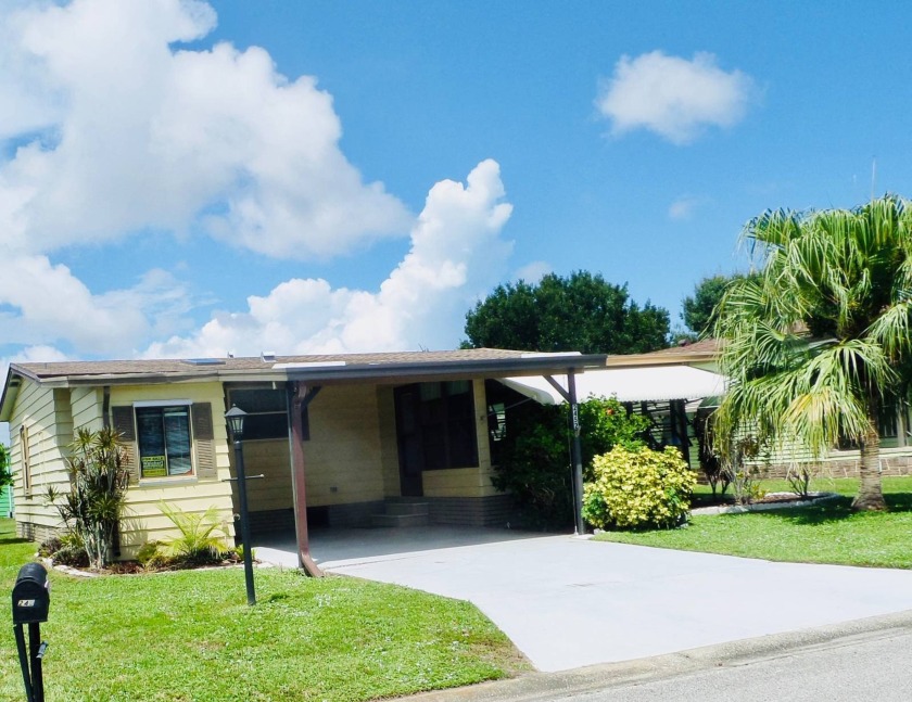 This lovely home in Quail Run has the LOWEST LOT RENT in the - Beach Home for sale in Melbourne, Florida on Beachhouse.com