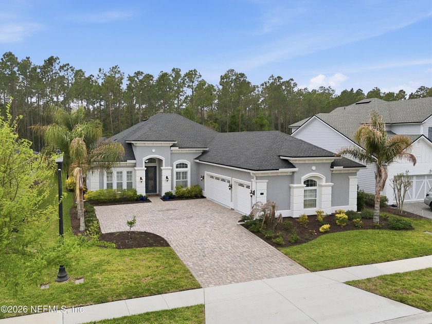 Discover a Coastal Oaks home that truly lives LARGE. Built in - Beach Home for sale in Ponte Vedra, Florida on Beachhouse.com