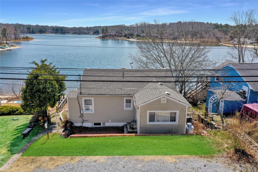 Experience Unparalleled Lakefront Living in this Recently - Beach Home for sale in Ridge, New York on Beachhouse.com