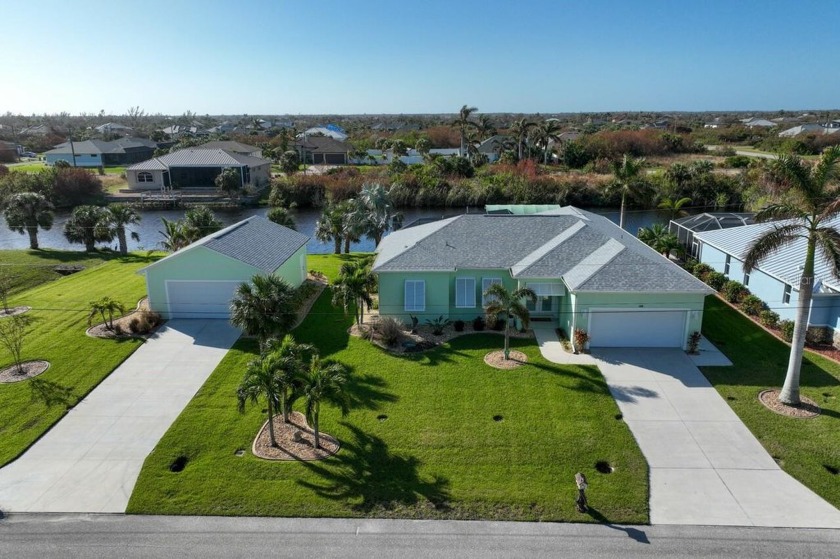 This pristine, updated waterfront home on a double lot features - Beach Home for sale in Port Charlotte, Florida on Beachhouse.com