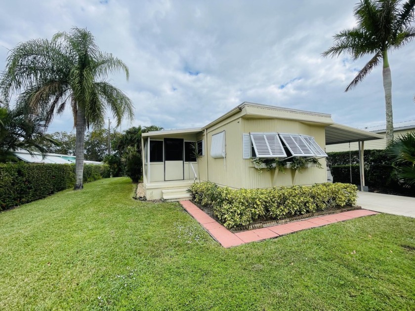 More photos coming! Welcome to your ideal beach bungalow! No HOA - Beach Home for sale in Hobe Sound, Florida on Beachhouse.com