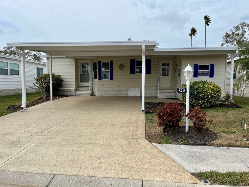 Charming Waterfront Retreat - 8711 26th Ave. E, Sun Key Village - Beach Home for sale in Palmetto, Florida on Beachhouse.com