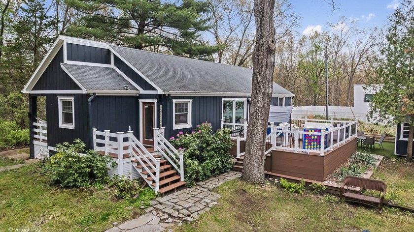Turnkey and beautifully updated, this completely remodeled - Beach Home for sale in Michigan City, Indiana on Beachhouse.com