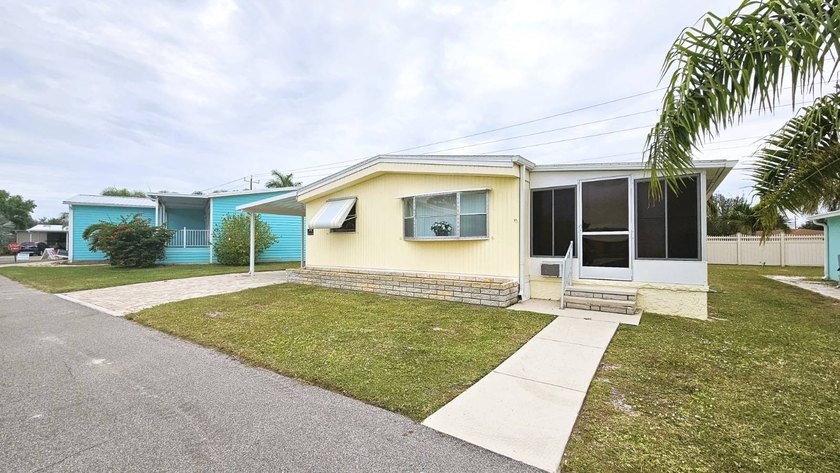 Welcome to your new home in a vibrant harbor-front 55+ community - Beach Home for sale in Punta Gorda, Florida on Beachhouse.com