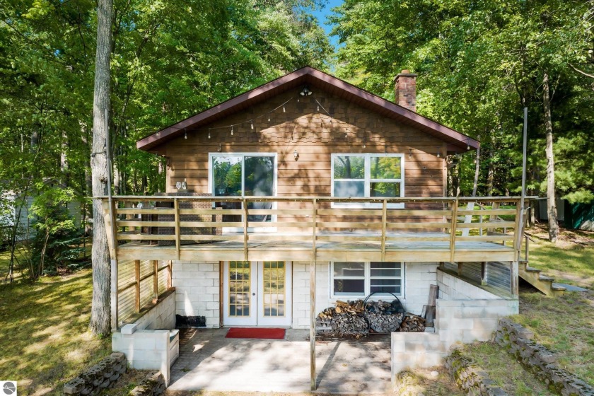 Bring the boat, fishing rods and water toys! Live like you're on - Beach Home for sale in Traverse City, Michigan on Beachhouse.com