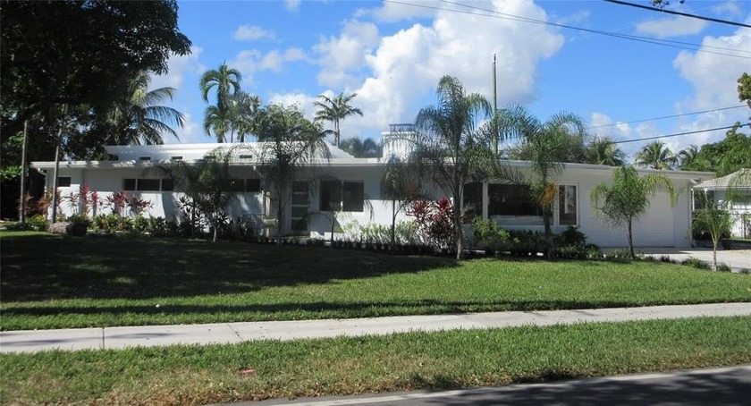 Mid Century Modern Frank Lloyd Wright inspired home meets Key - Beach Home for sale in Lighthouse Point, Florida on Beachhouse.com