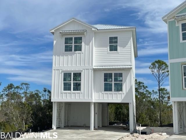 SURROUNDED BY WETLANDS ON TWO SIDES! This Sunset cottage is - Beach Home for sale in Orange Beach, Alabama on Beachhouse.com