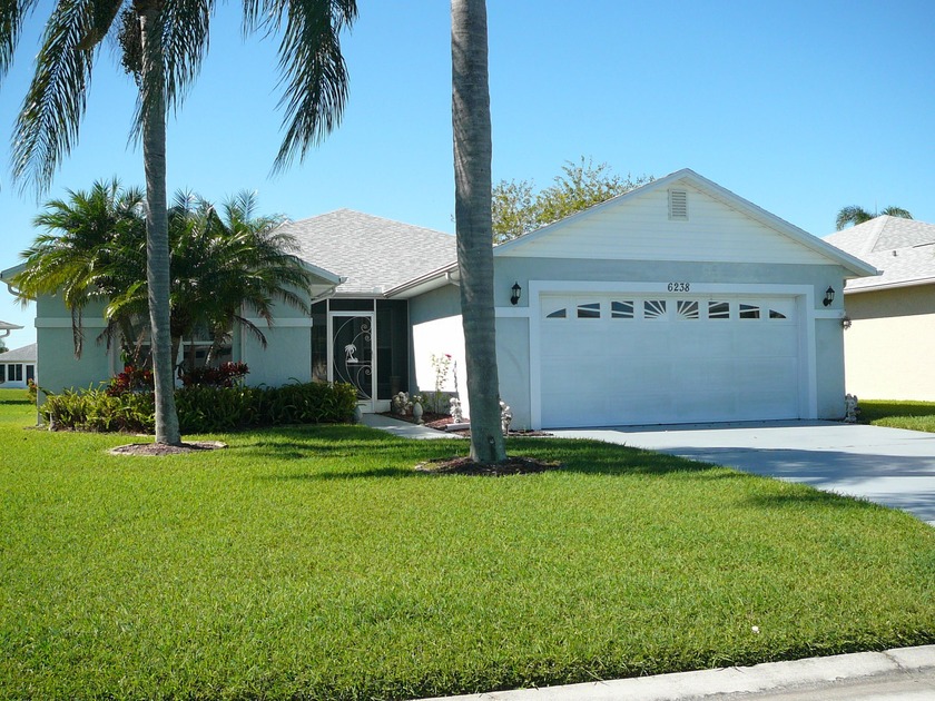 THIS 3/2/2 WATERFRONT CBS HOME IN THE ACTIVE ADULT GATED - Beach Home for sale in Fort Pierce, Florida on Beachhouse.com